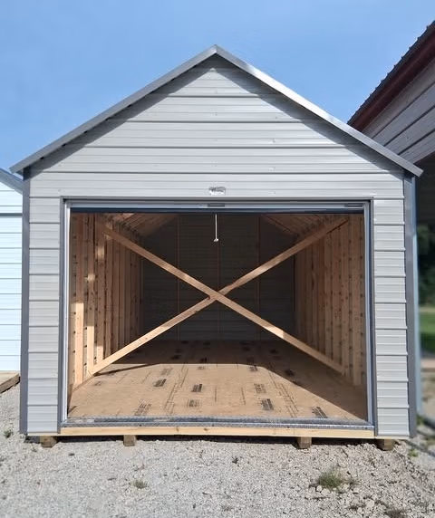 12x24 Value Shed with raised walls and 9x7 Roll up door. Charcoal Ash Gray Charcoal Backyard Buildings BYB